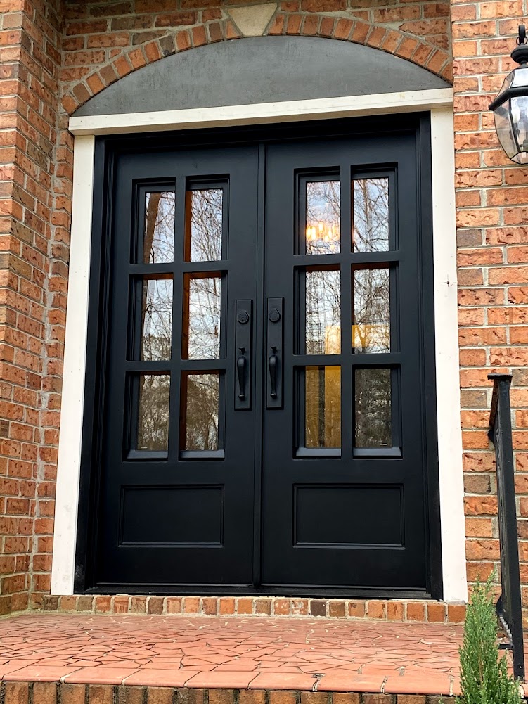 Black-colored glass door
