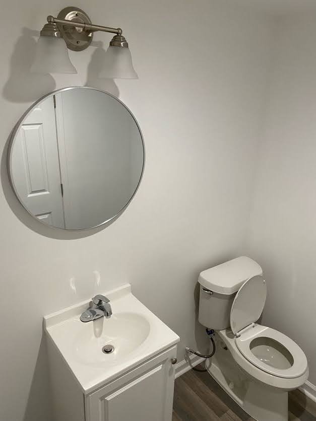 All-white toilet area