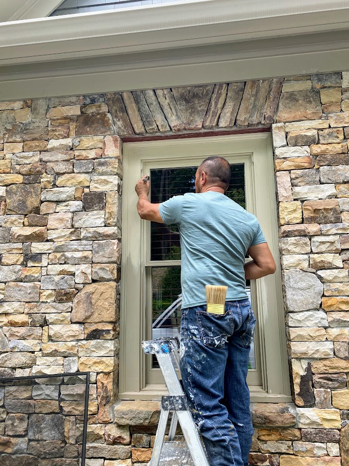 A man fixing a window