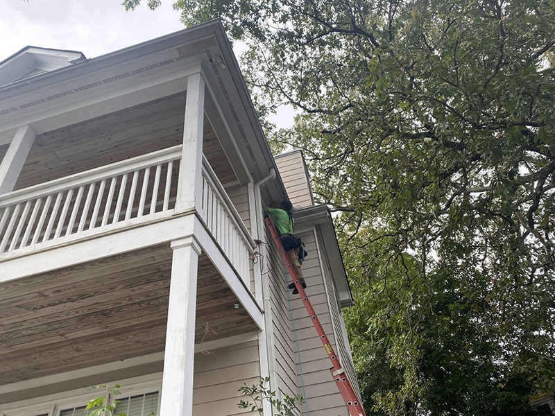 Man fixing outdoor ceiling