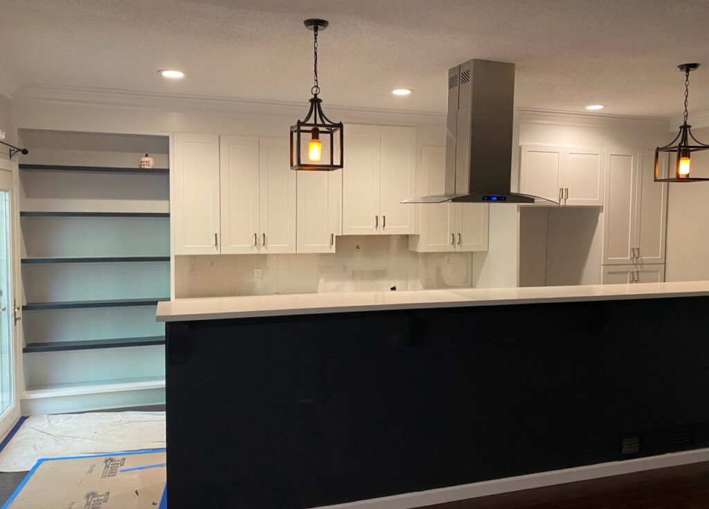 The light fixtures have been installed in this kitchen remodel.